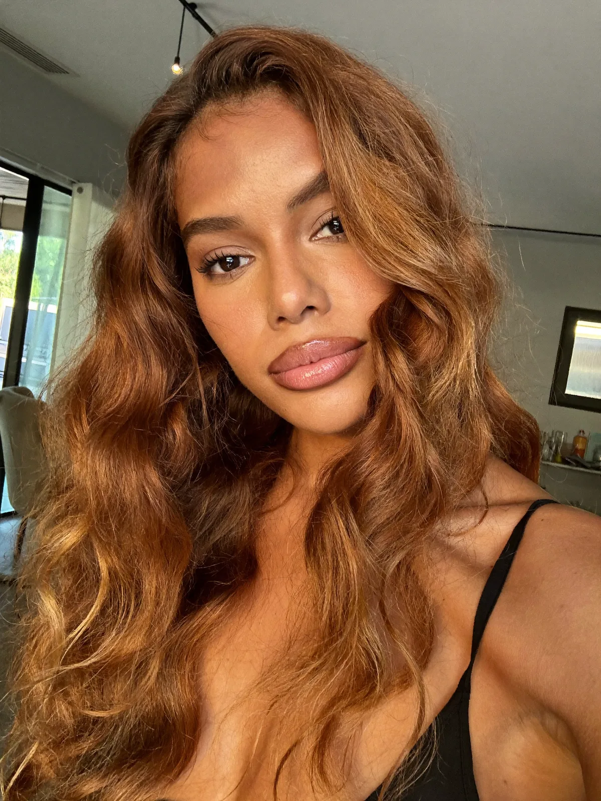 Soft Voluminous Waves in Warm Caramel Brown for Natural Shine