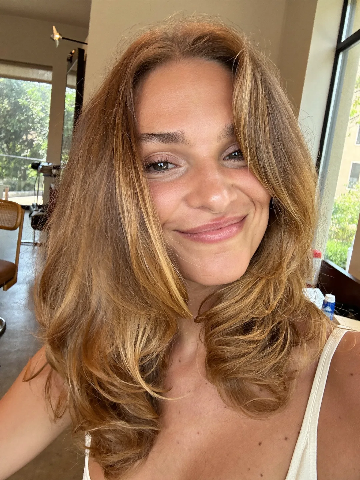 Soft Layered Blowout with Warm Caramel Brown Balayage Tones