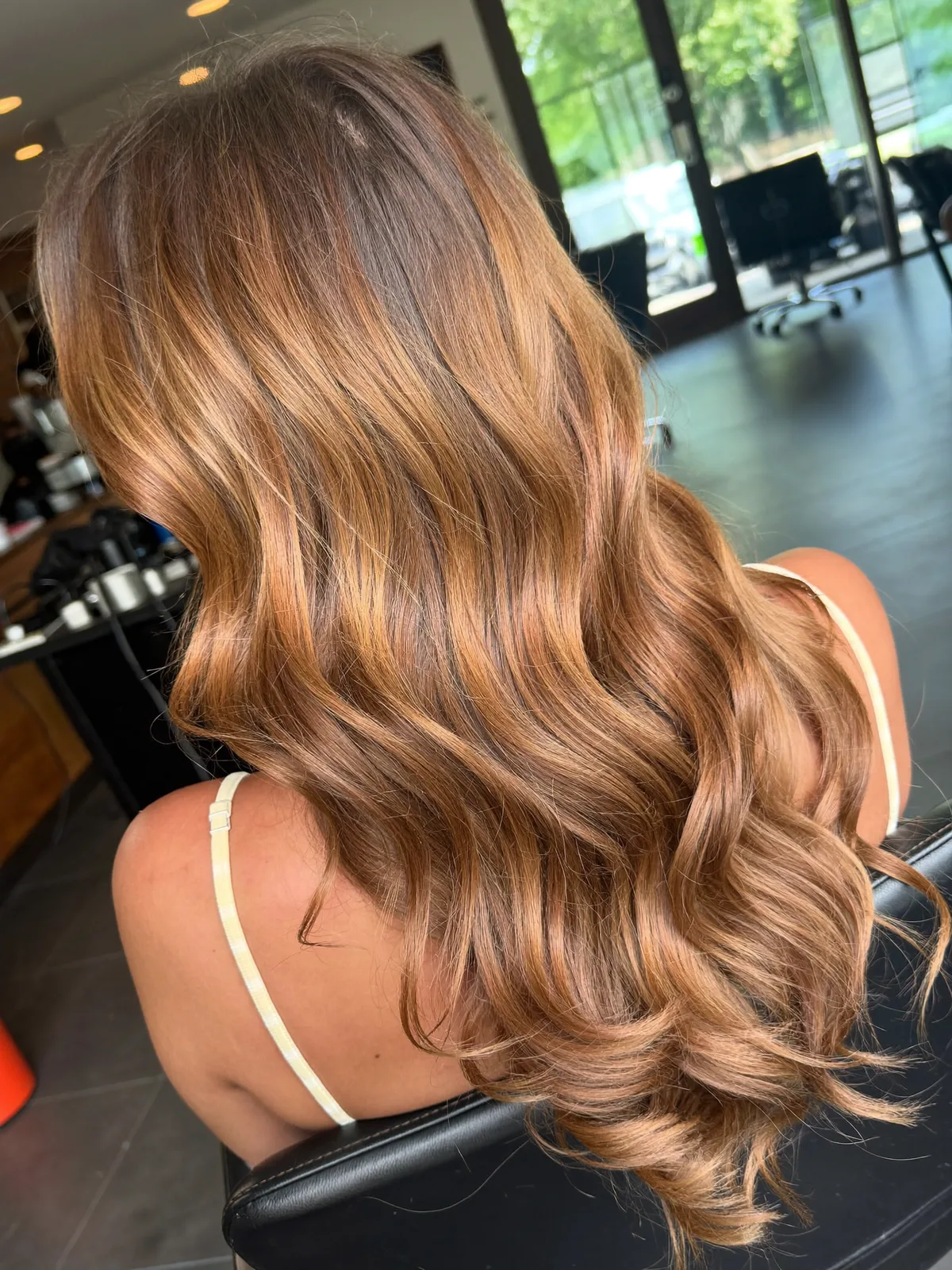 Soft Balayage Waves featuring Warm Caramel Brown Highlights