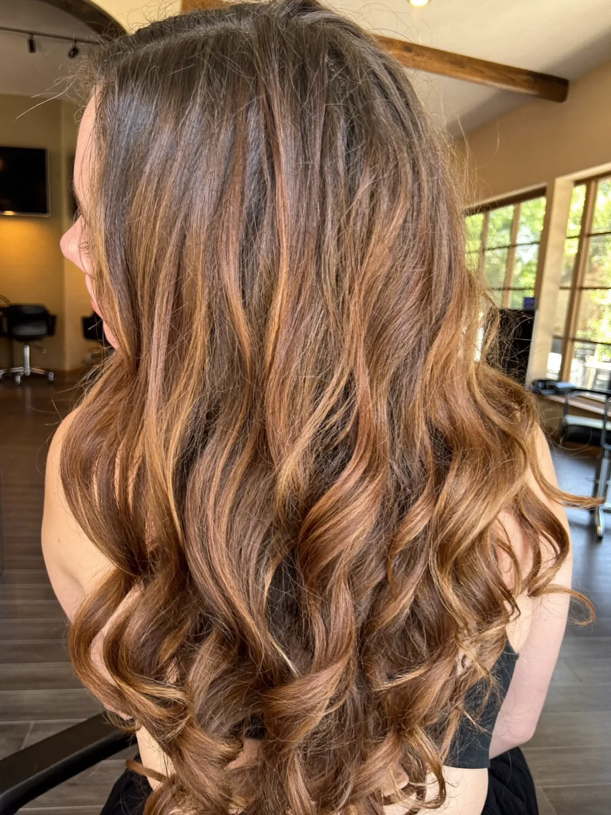 Voluminous Loose Curls with Warm Caramel Brown Balayage Shine