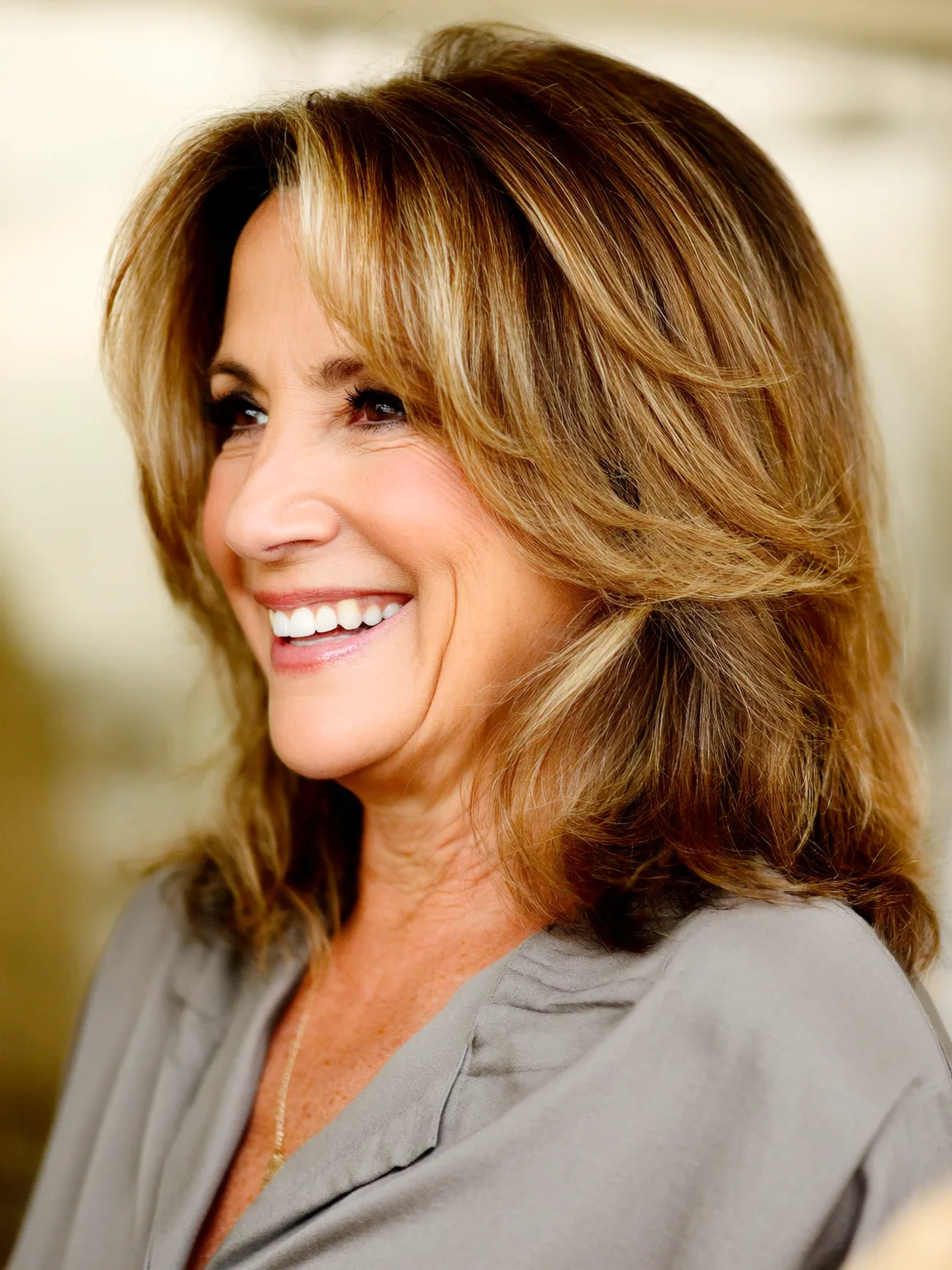 Shoulder-Length Layered Cut with Warm Caramel Highlights