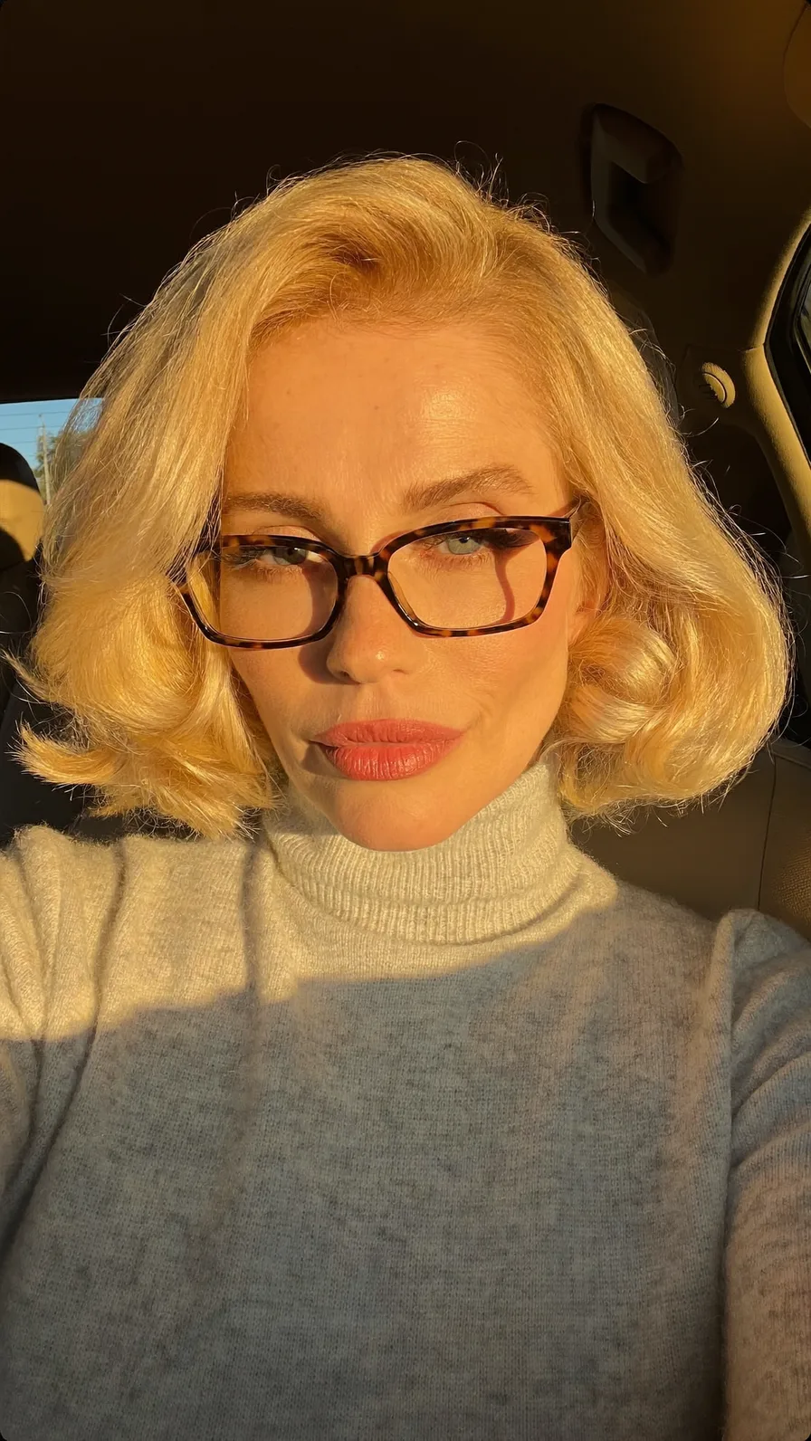 Classic Shoulder-Length Flicked Bob with Platinum Blonde Shine