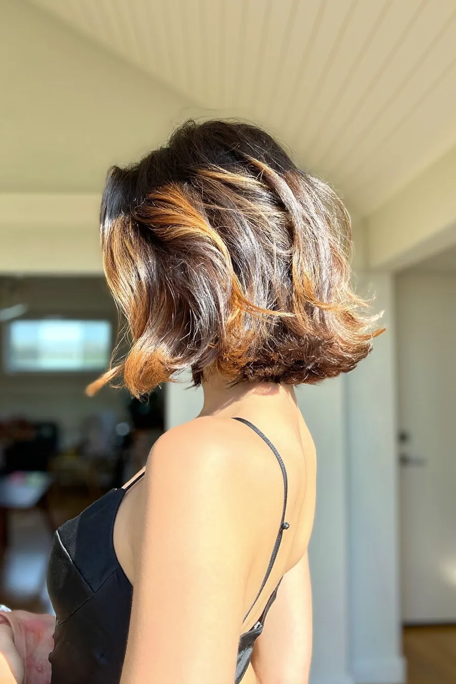 Chic Chin-Length Bob with Warm Copper Highlighted Flicked Ends