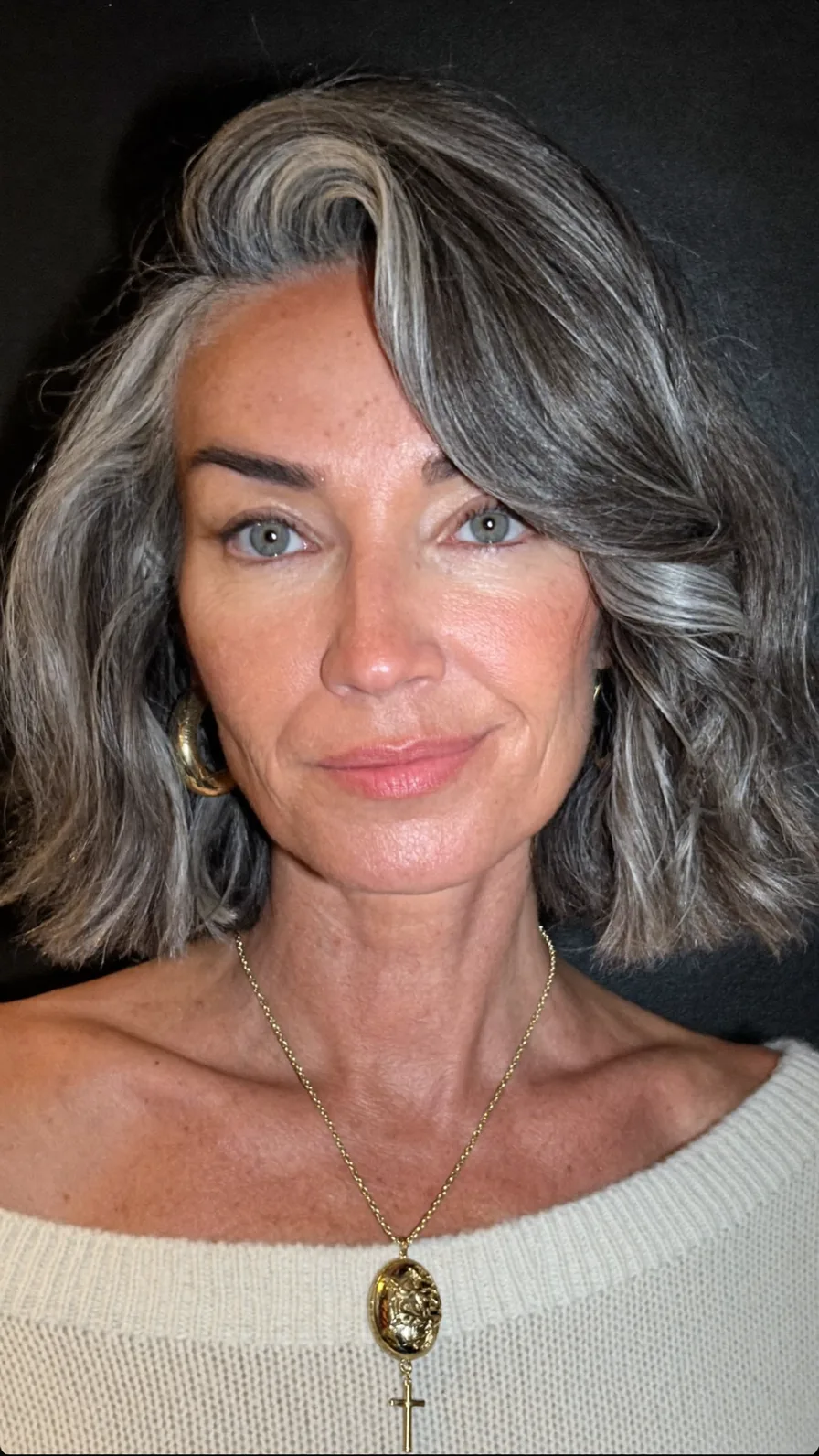 Chin-Length Wavy Salt and Pepper Bob with Side-Swept Bangs