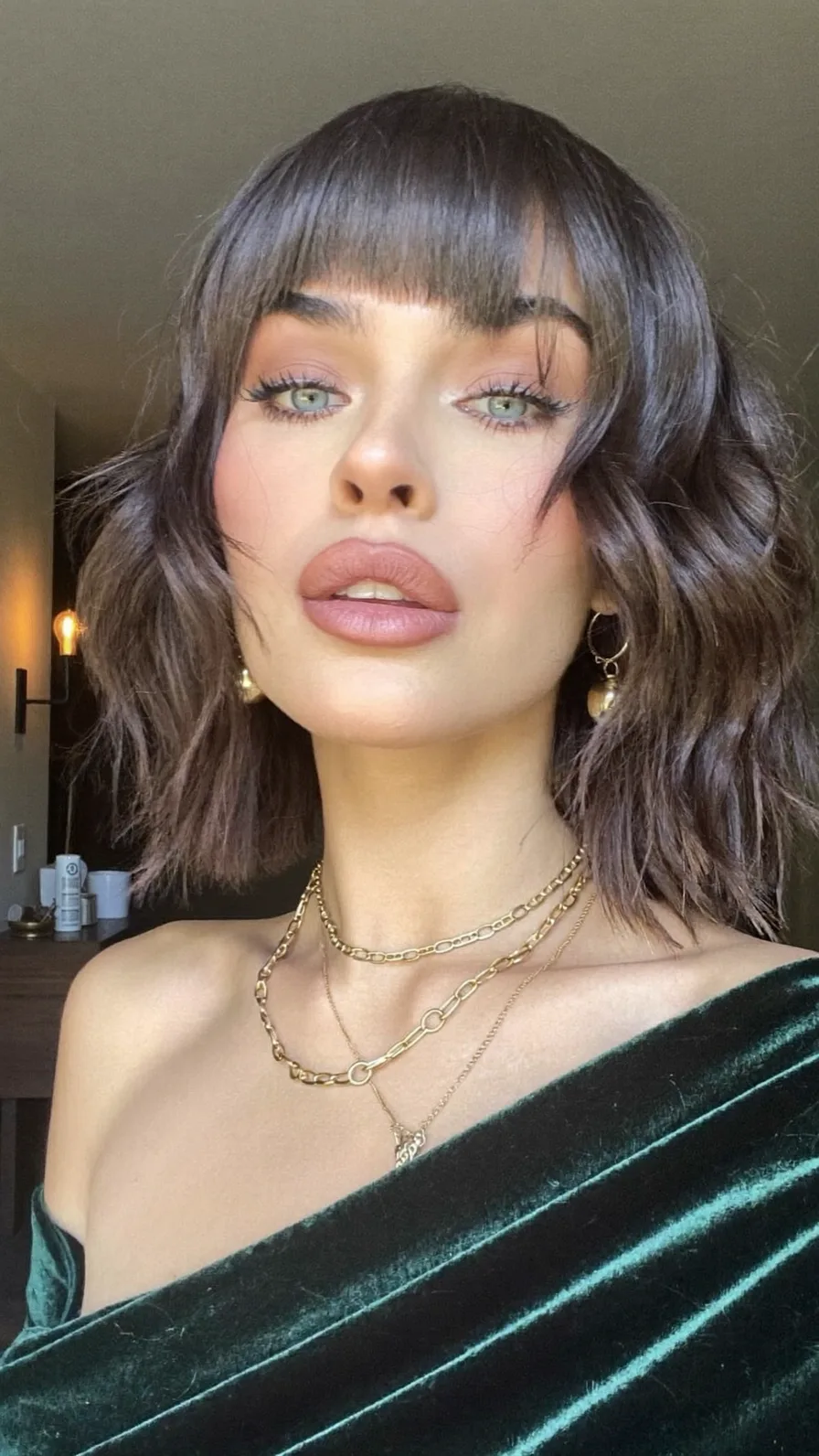 Choppy Textured Chin-Length Bob with Blunt Bangs Style