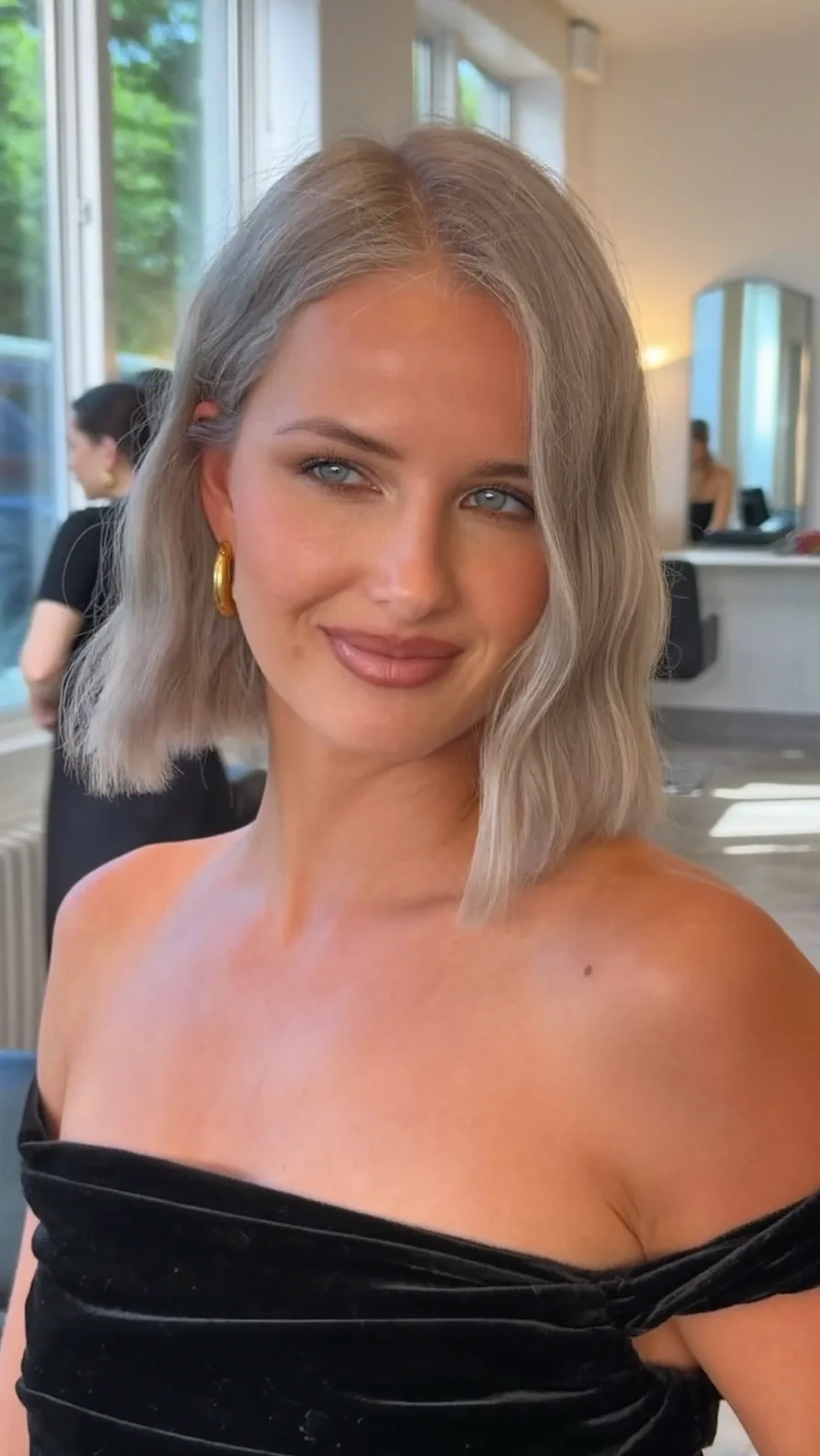 Elegant Chin-Length Blunt Bob with Cool Ash Blonde Color