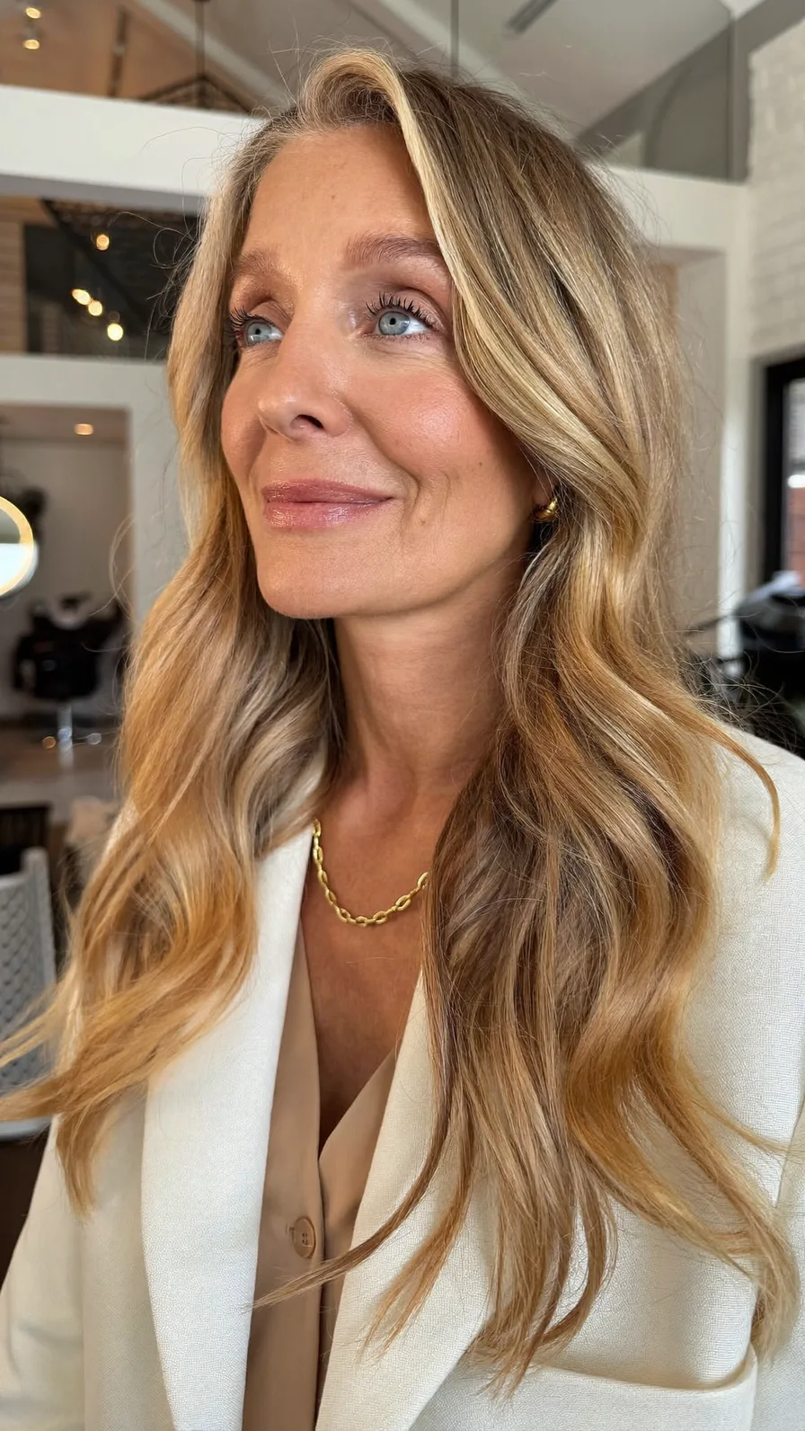 Elegant Long Layers with Warm Honey Blonde Balayage Highlights