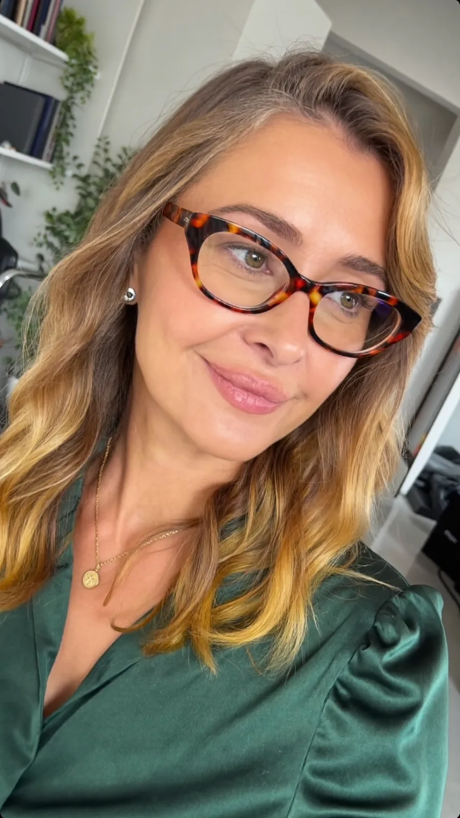 Wavy Honey Blonde Medium-Length Side-Swept Layered Hairstyle