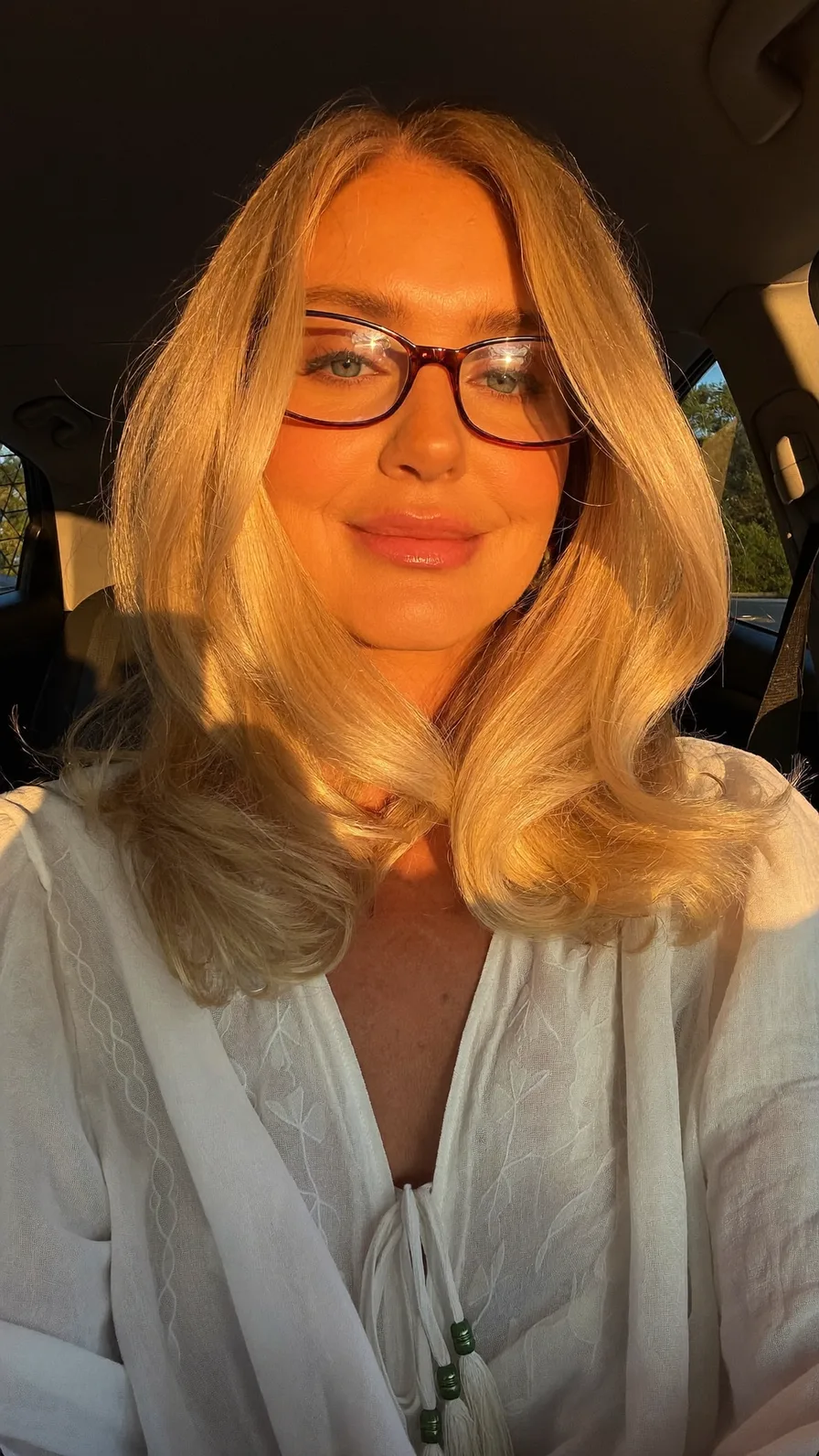Voluminous Golden Blonde Long Layers with Center Part