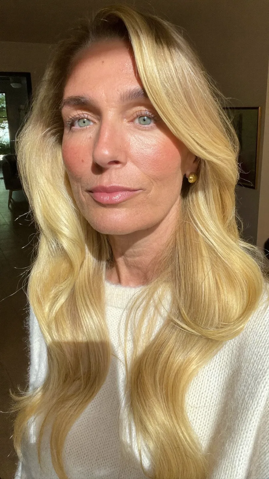 Soft Honey Blonde Long Layers with Side-Swept Bangs