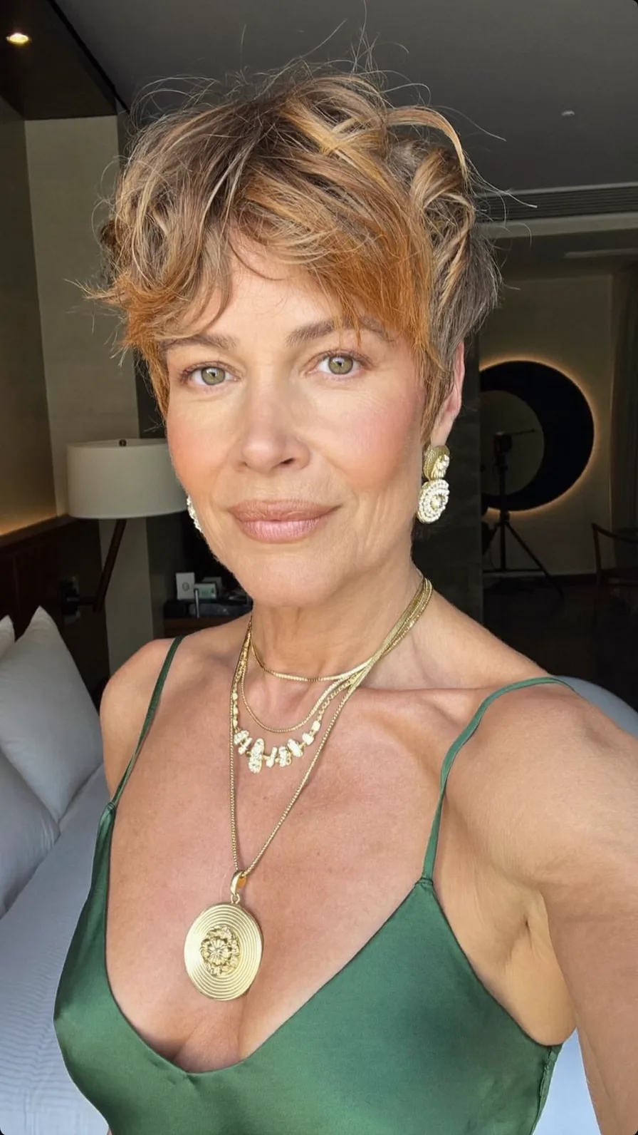 Textured Voluminous Pixie Cut with Warm Caramel Highlights