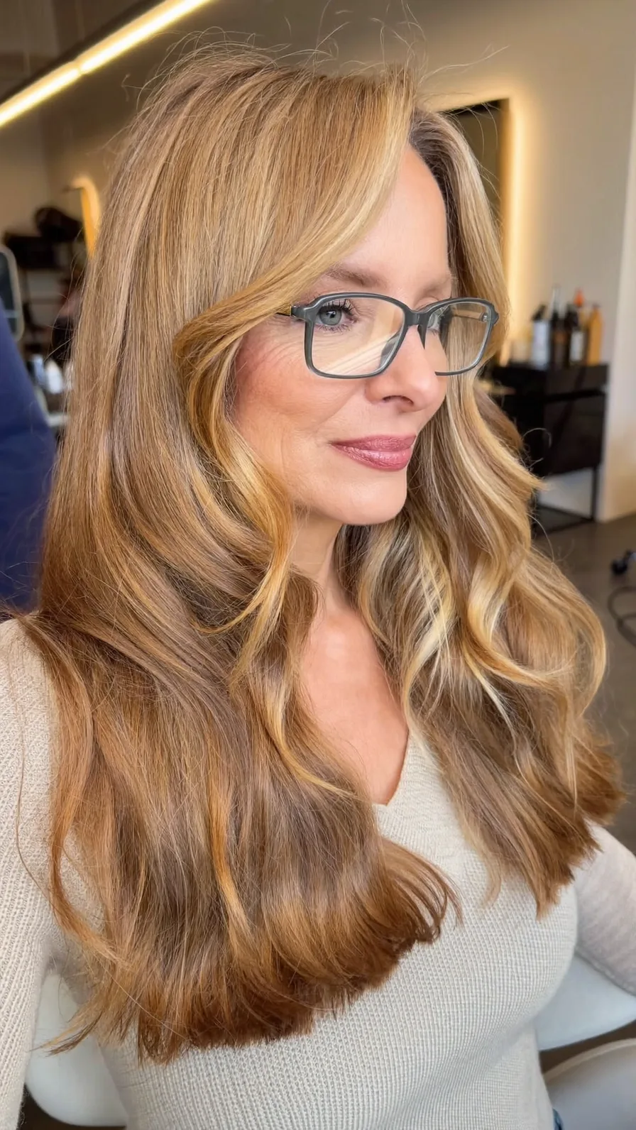 Classic Medium-Length Layered Wavy Hair with Honey Blonde Balayage