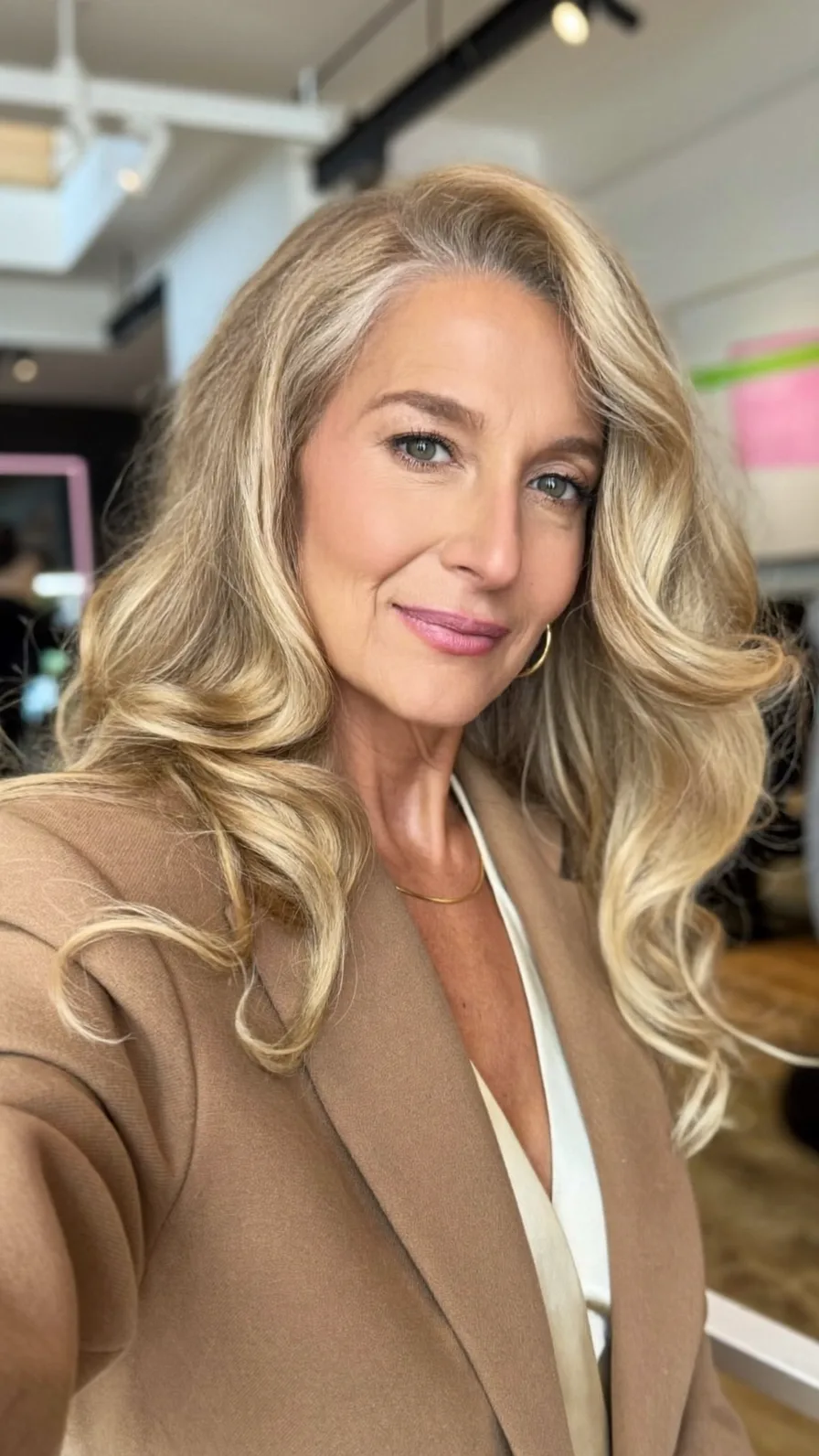 Elegant Voluminous Long Ash Blonde Waves with Soft Layers