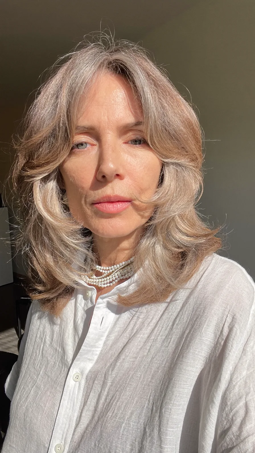 Soft Feathered Medium Length Hair with Curtain Bangs