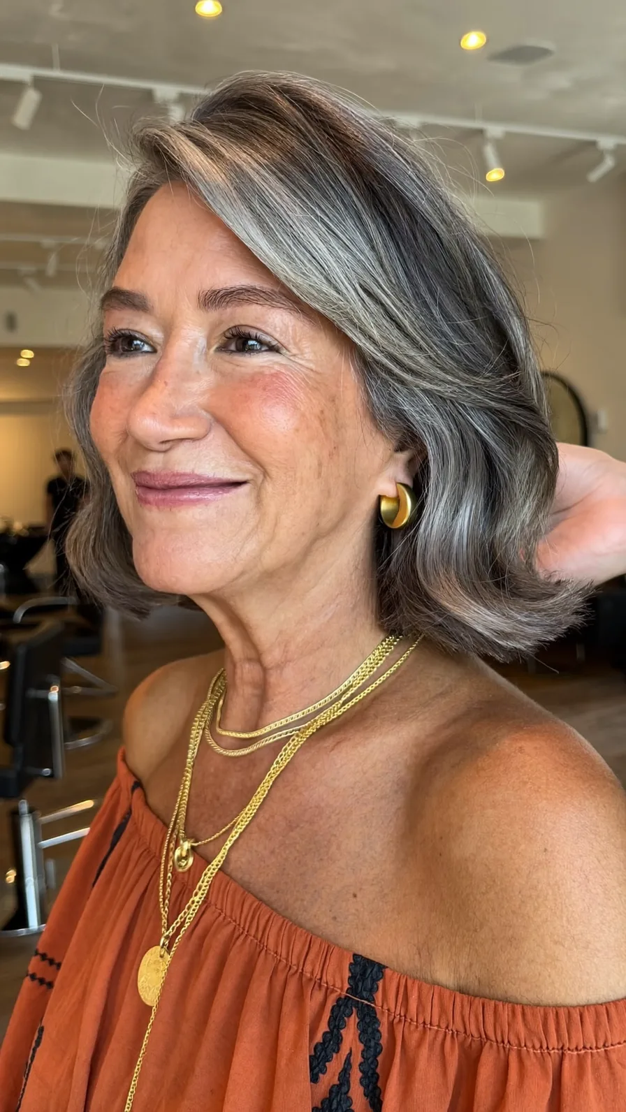 Elegant Soft Layered Chin-Length Bob With Side-Swept Bangs