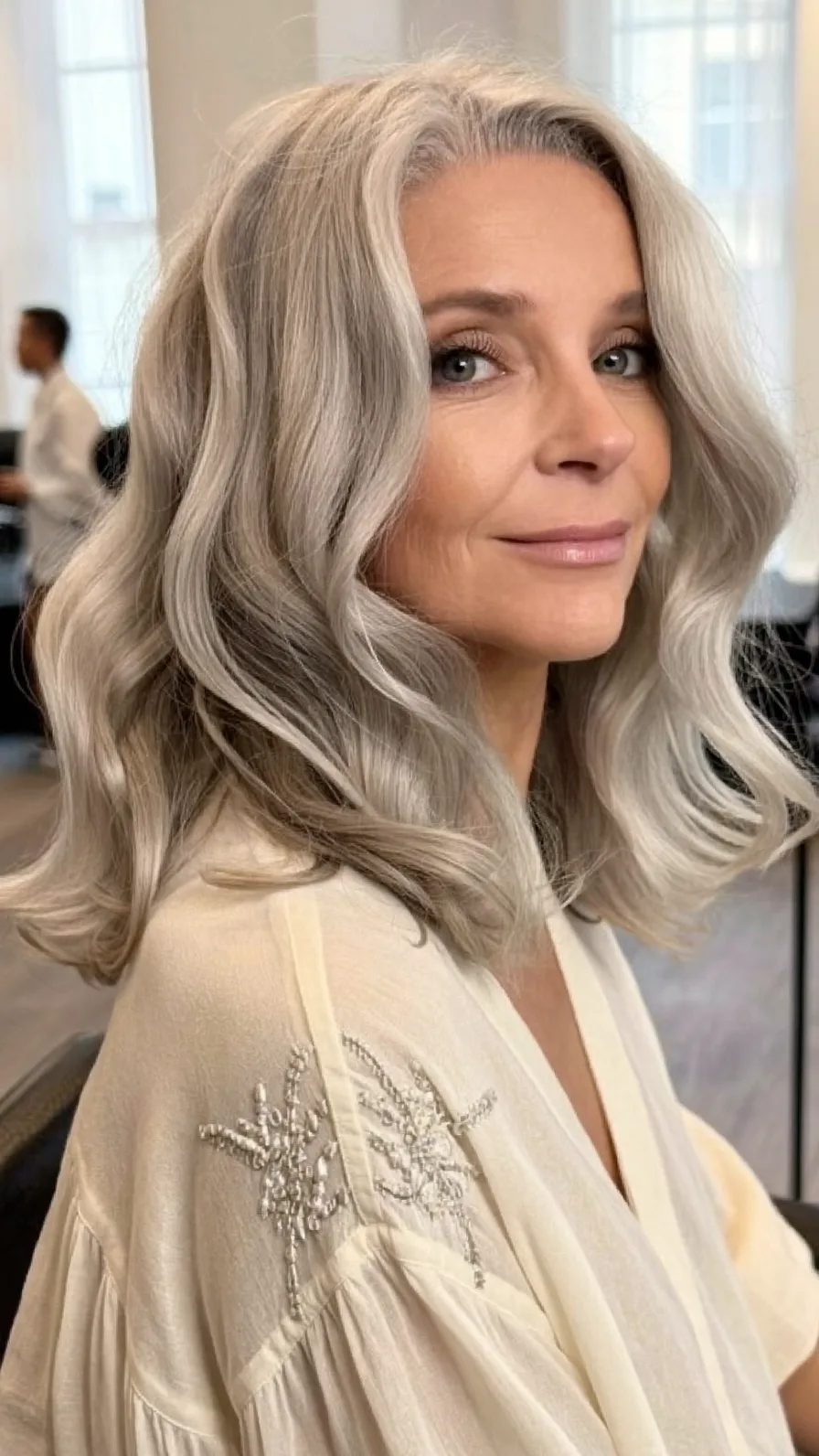 Elegant Medium Wavy Silver Hair with Soft Side-Swept Layers