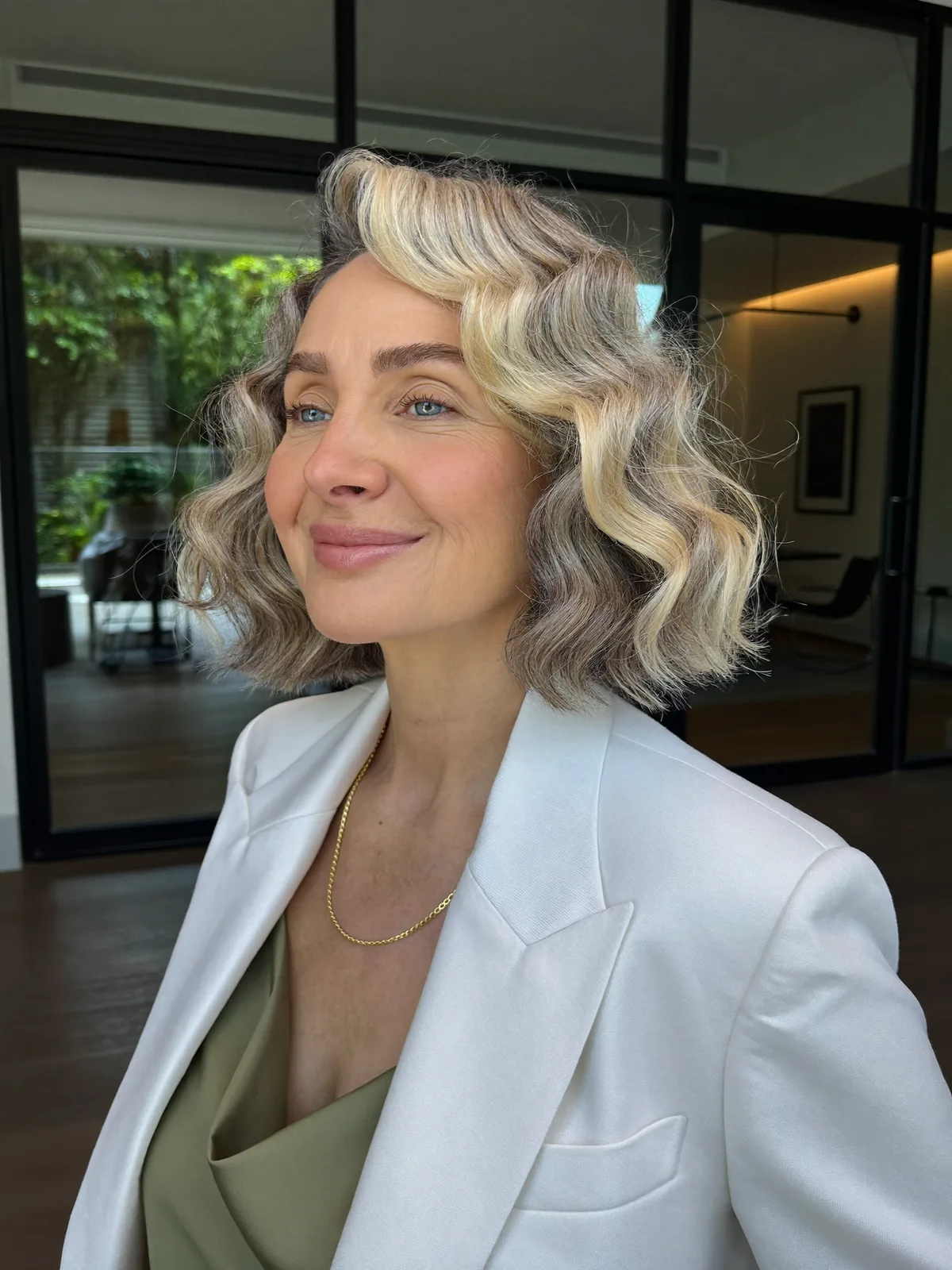 Soft Silver Balayage Waves with Voluminous Side Part for Mature Women