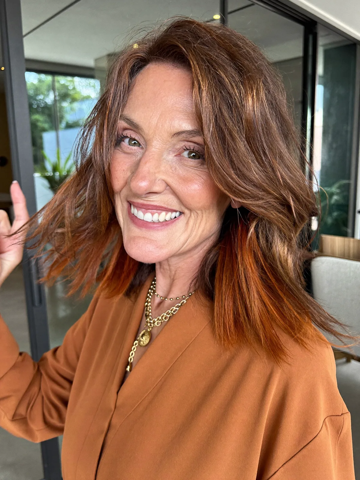 Warm Copper Balayage Waves with Face-Framing Layers for Mature Hair