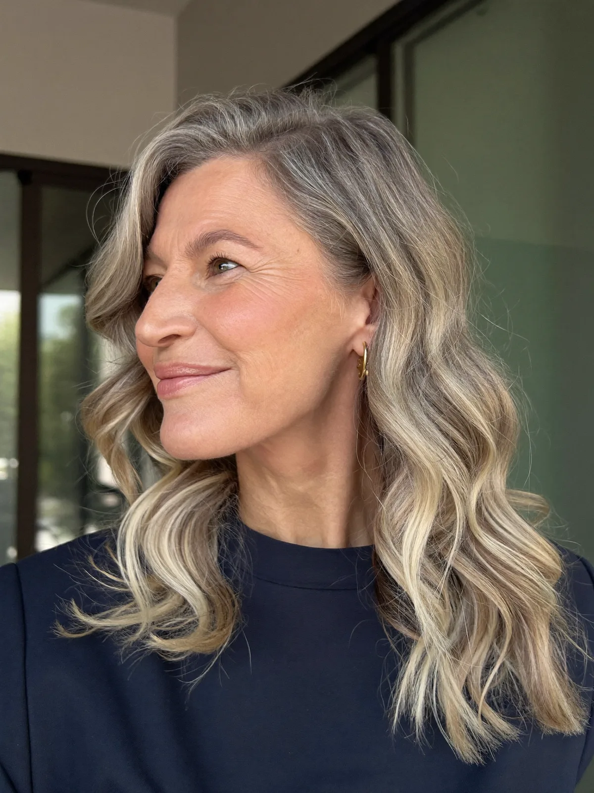 Soft Silver Balayage Waves with a Natural Side Part for Mature Women