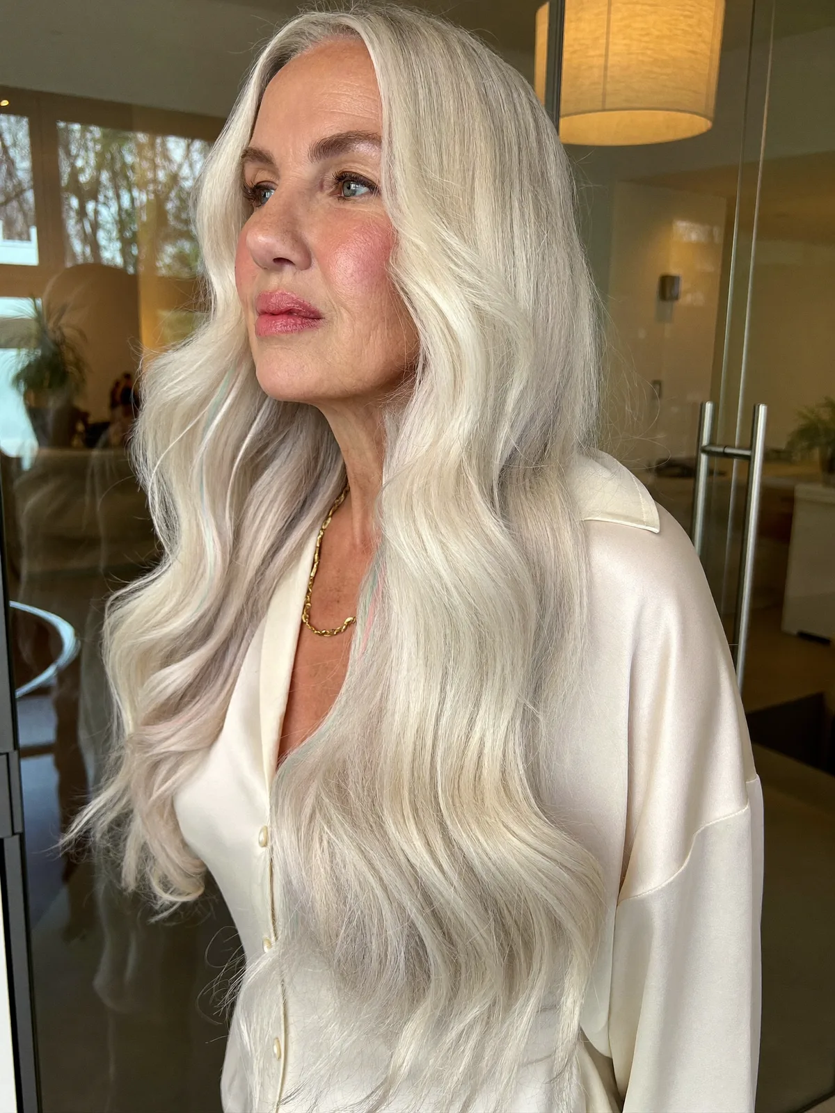 Silky Silver Waves with Soft Center Part for Mature Elegance