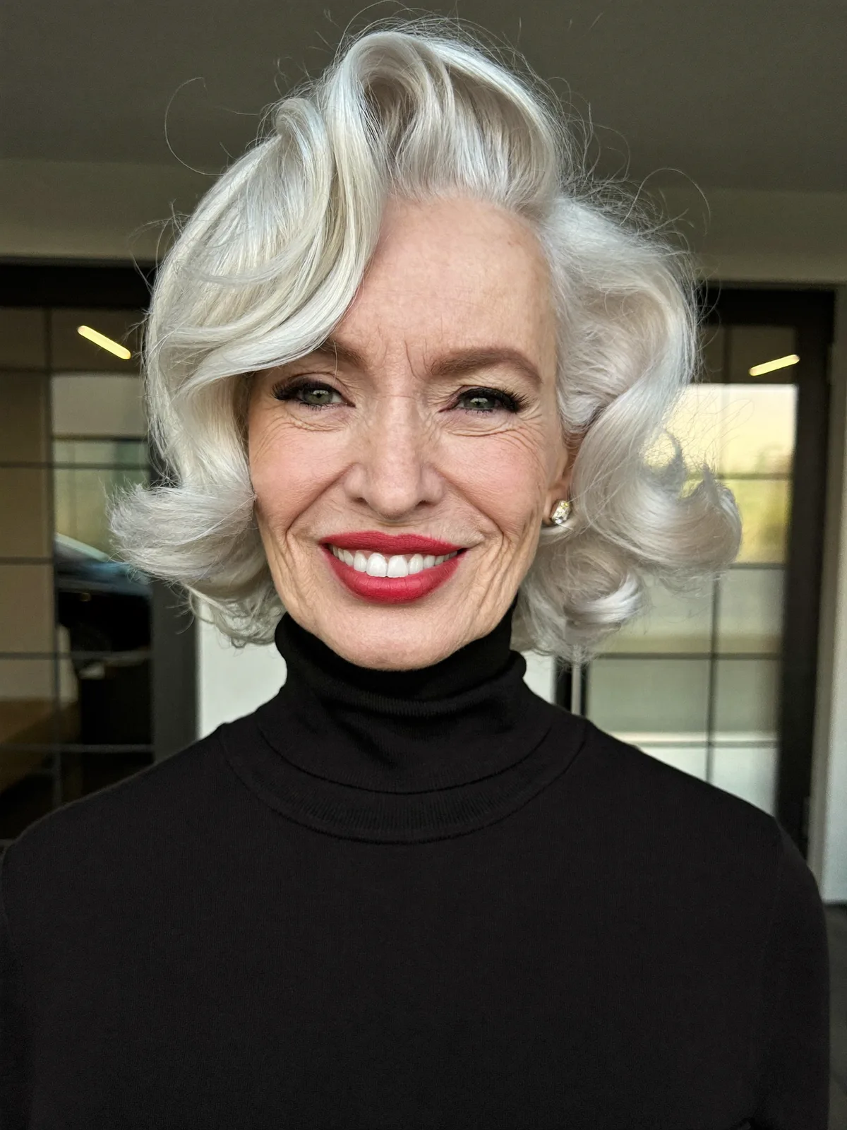 Elegant Silver Voluminous Waves with Vintage-Inspired Side Sweep for Mature Hair