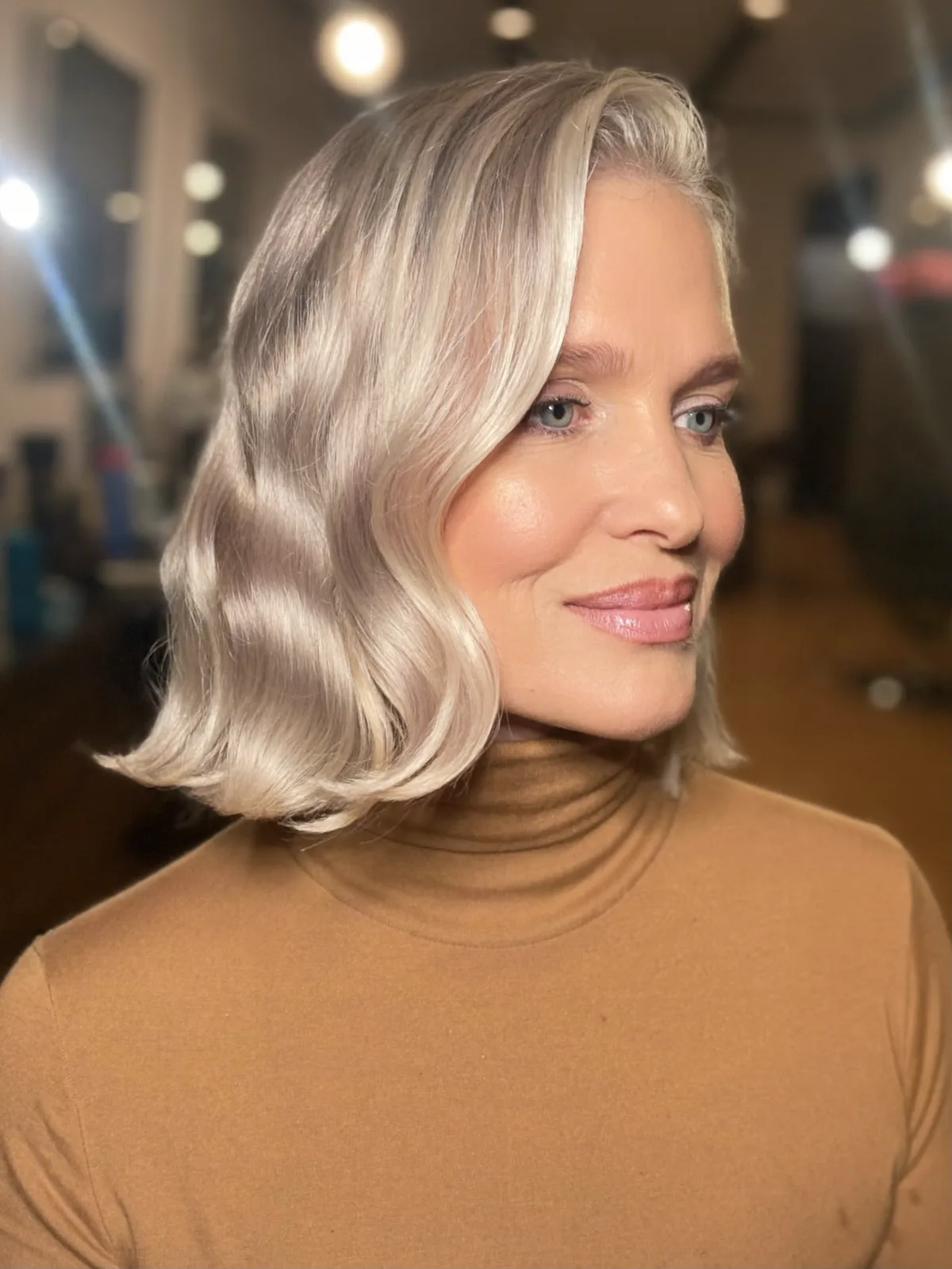 Elegant Silver Waves with Soft Side Part for Mature Women