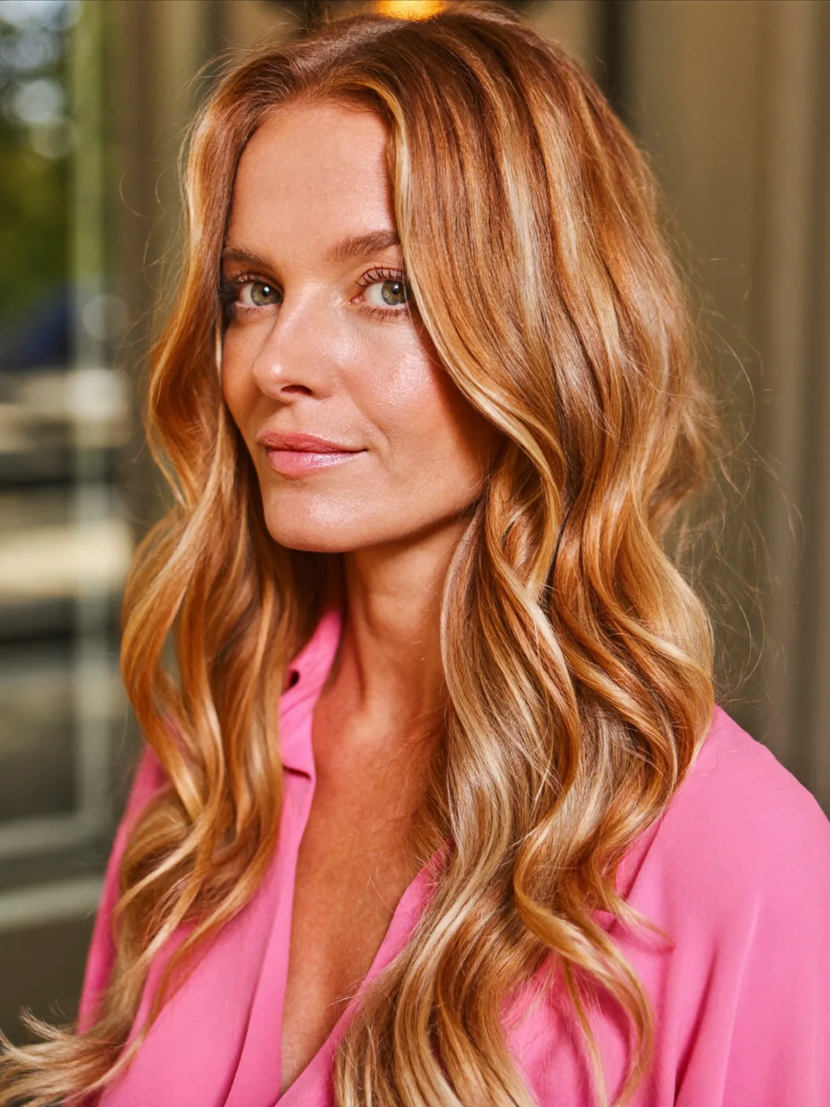 Golden Copper Balayage Waves with Soft Face-Framing Layers for Mature Women