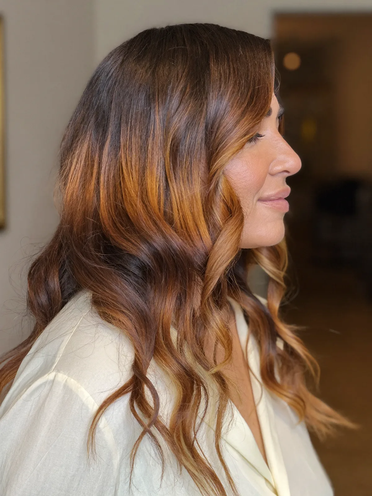 Soft Copper Balayage Waves with Gentle Face-Framing Layers for Women Over 60