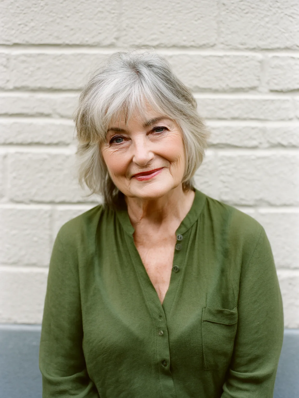 Chin-Length Silver Frost Layers with Side-Swept Bangs