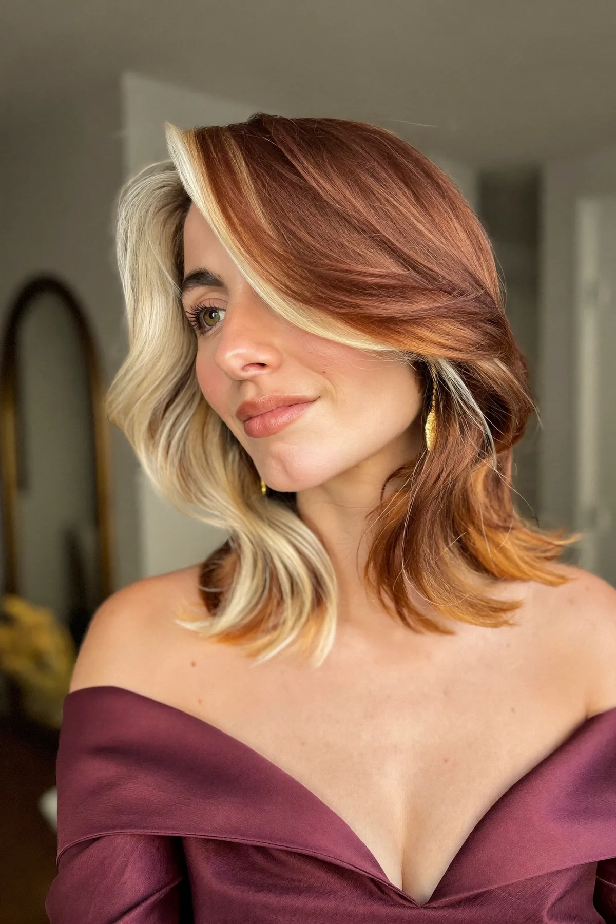 Auburn Copper Collarbone-Length Lob with Chunky Face-Framing Highlights