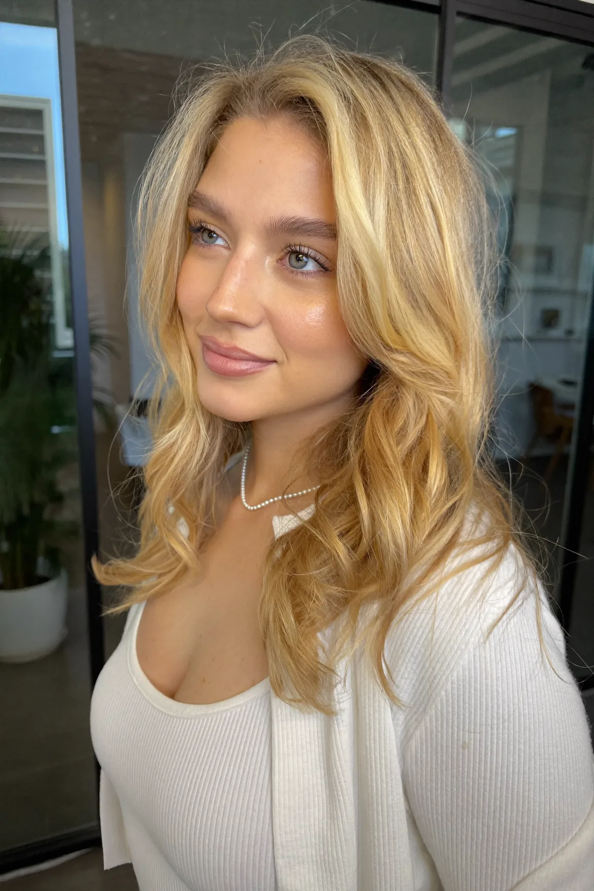 Honey Golden Blonde Lob with Wavy Texture and Curtain Bangs