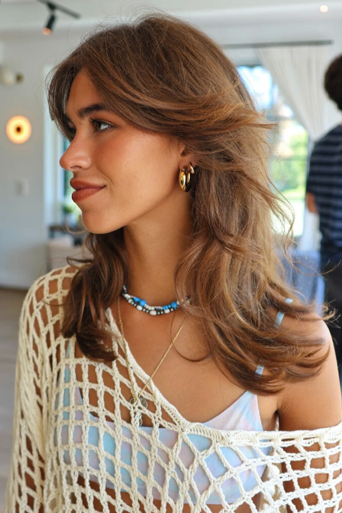 Collarbone-Length Caramel Bronde Balayage Lob with Curtain Bangs