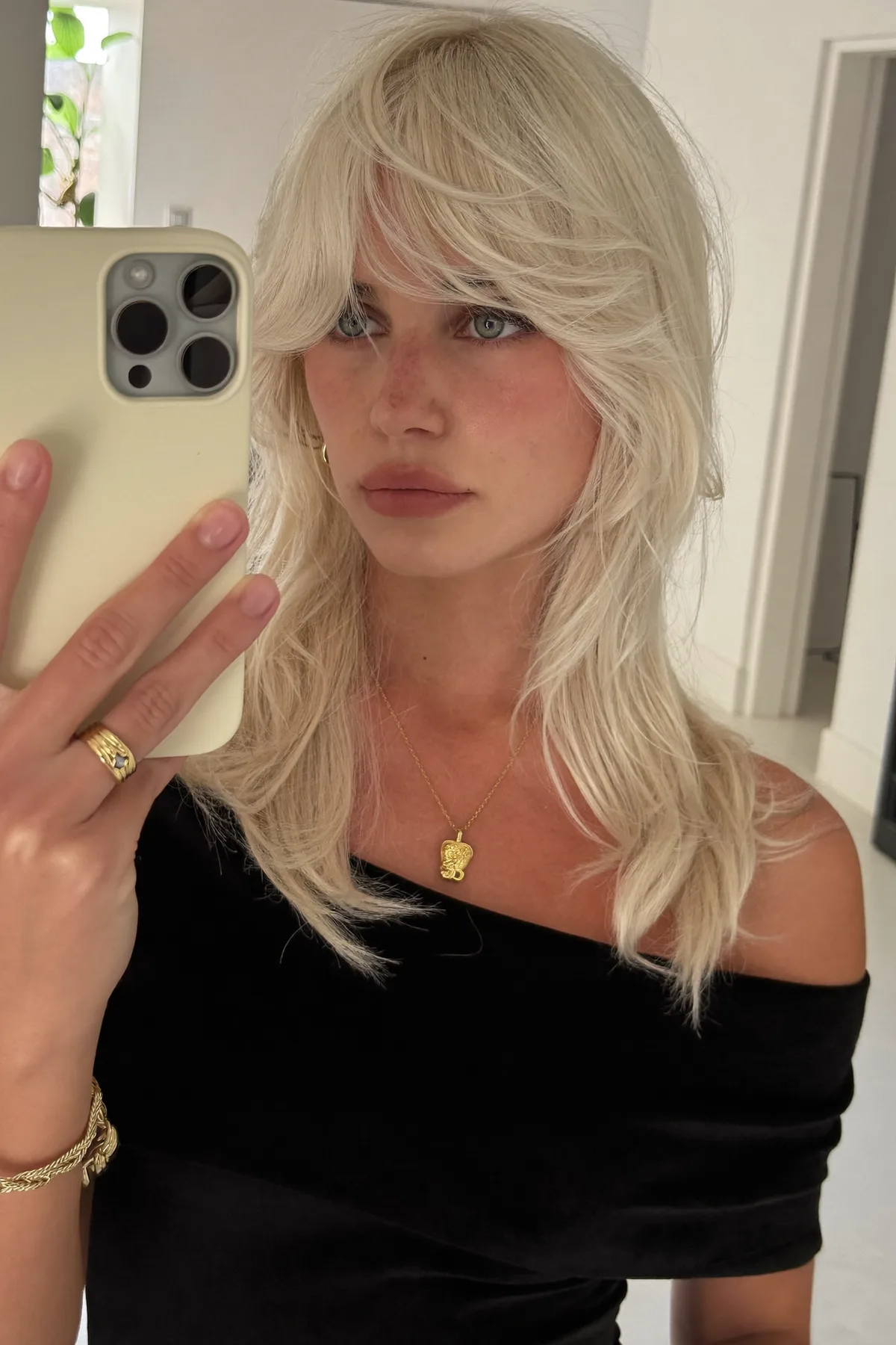 Platinum Ash Blonde Collarbone-Length Lob with Curtain Bangs