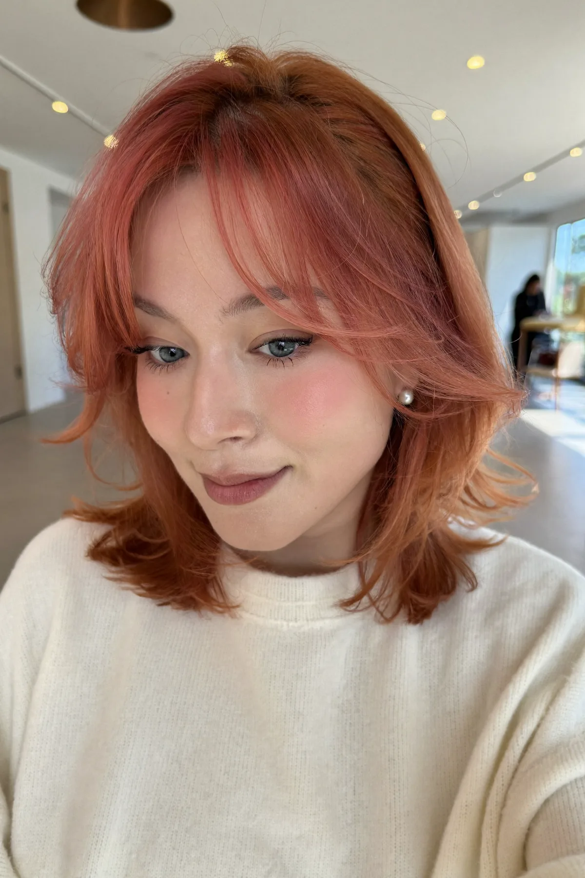 Soft Wavy Strawberry Blonde Lob with Curtain Bangs Perfection