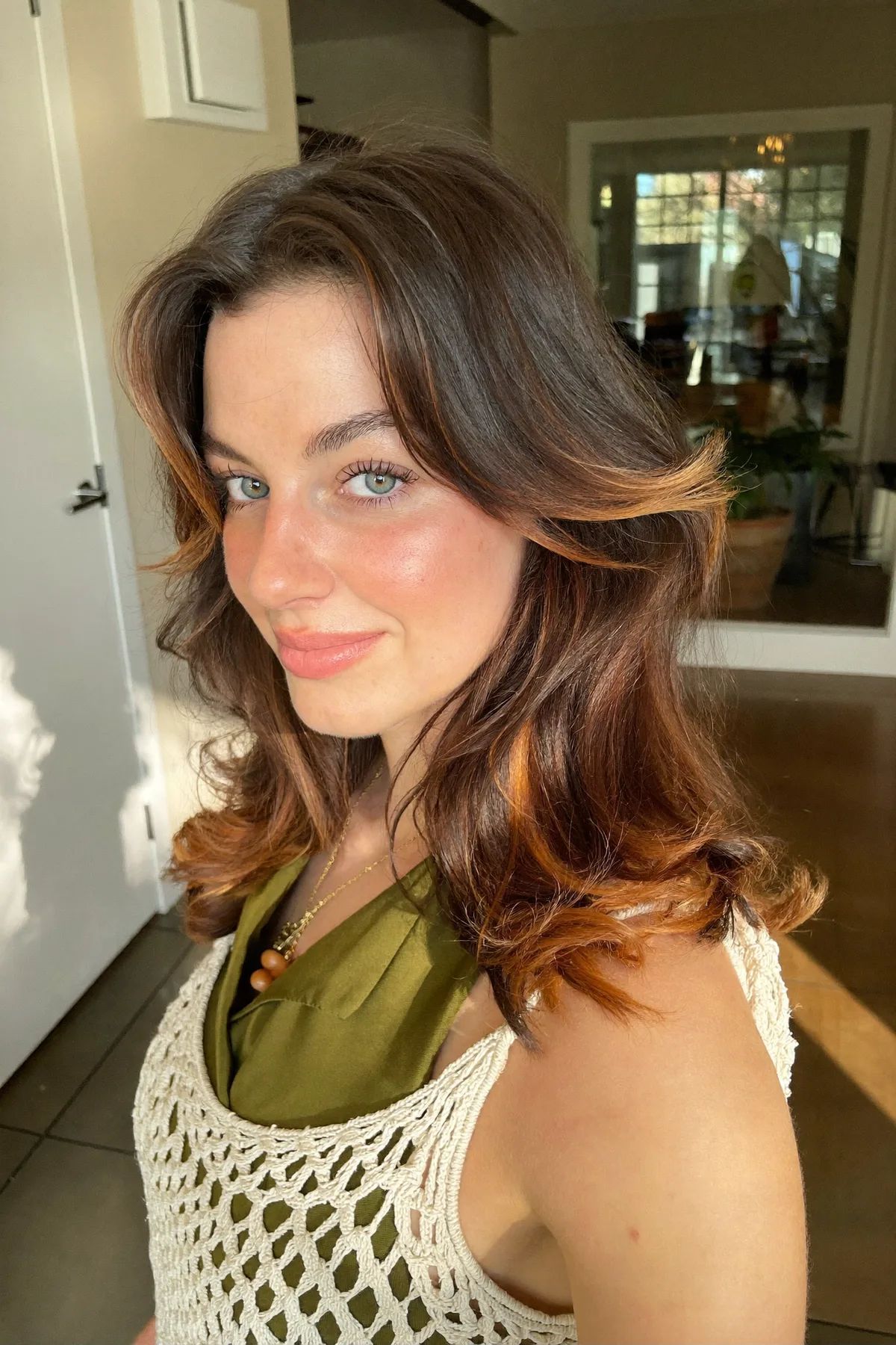 Caramel Bronde Balayage Collarbone-Length Lob with Wavy Curtain Bangs