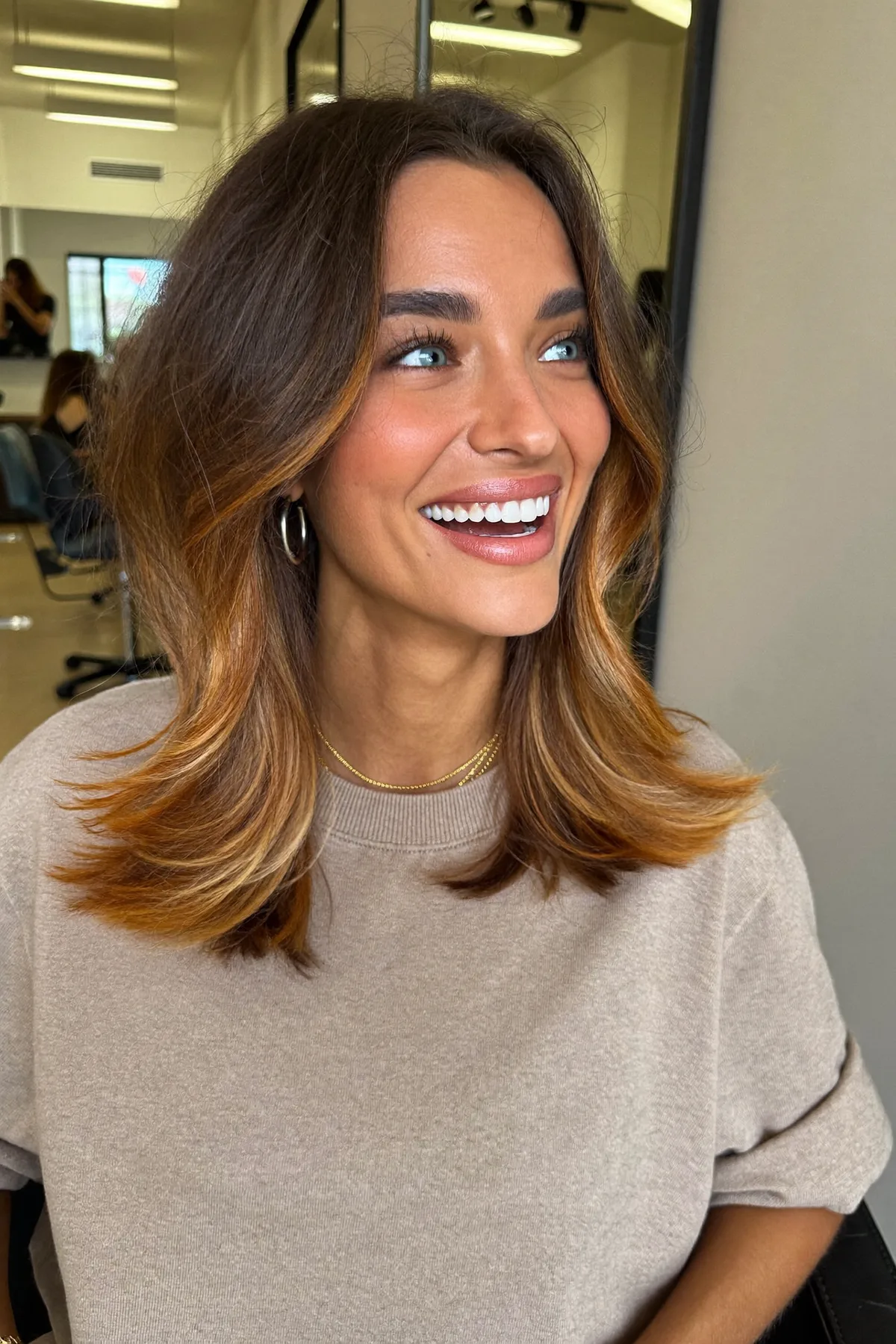 Caramel Bronde Balayage Long Bob with Shoulder-Length Waves