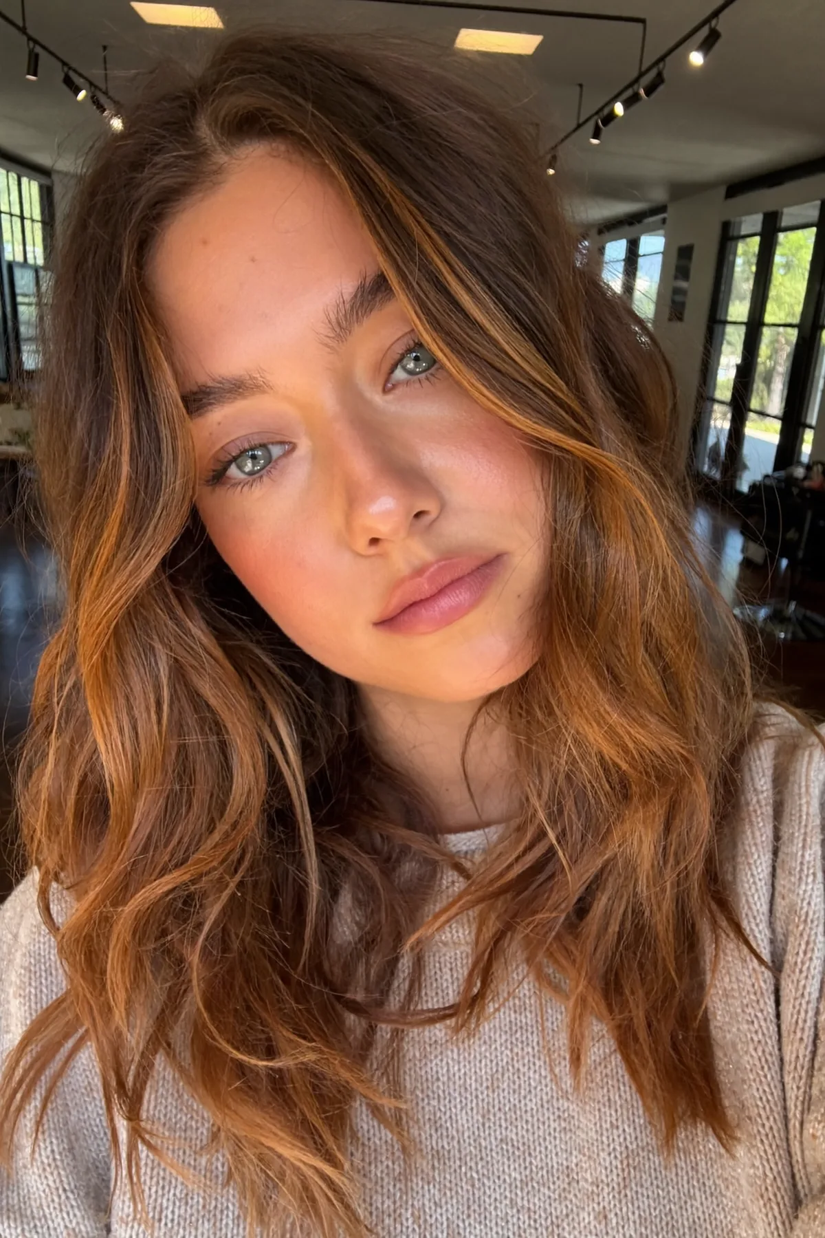 Caramel Bronde Balayage Collarbone-Length Lob with Curtain Bangs