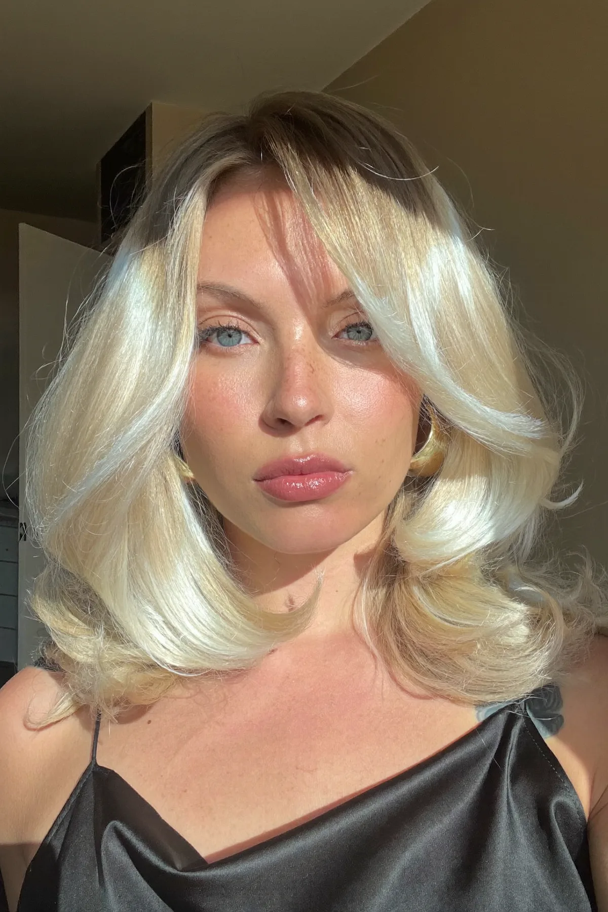 Platinum Ash Blonde Wavy Long Bob with Curtain Bangs