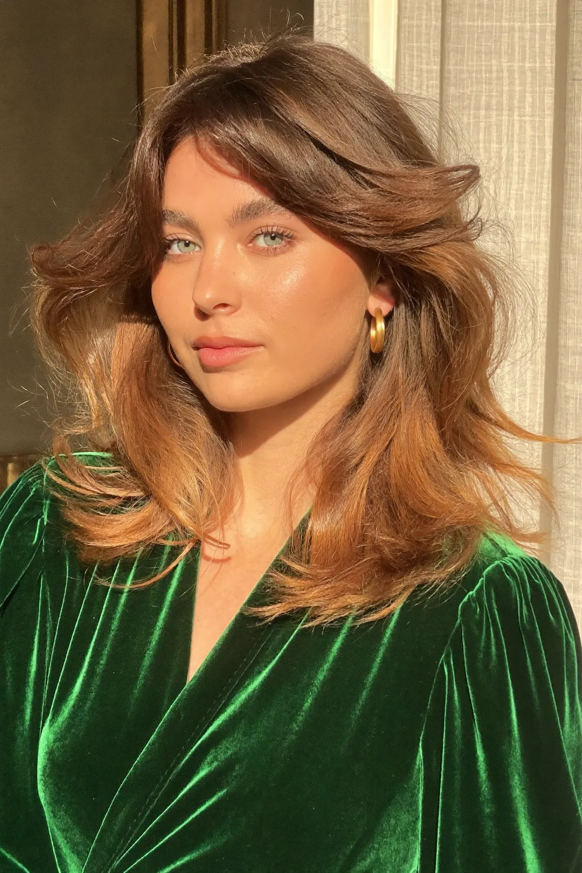 Caramel Bronde Balayage Long Bob with Wavy Curtain Bangs