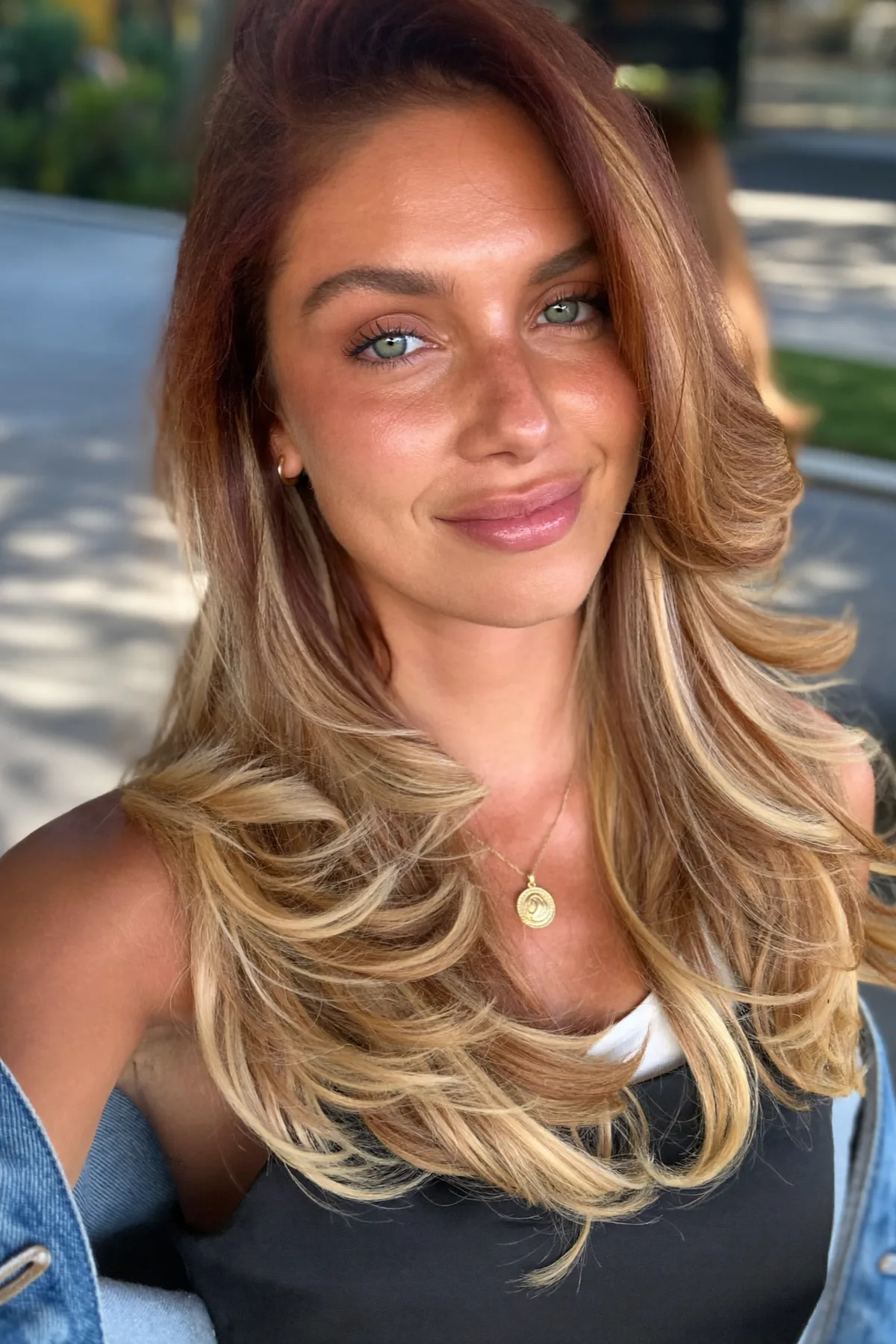 Caramel Bronde Balayage on Long Layered Mid-Back Waves