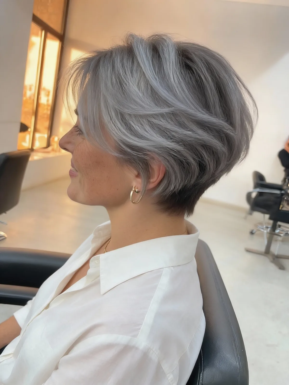 Versatile Silver Frost Wavy Pixie with Side-Swept Bangs