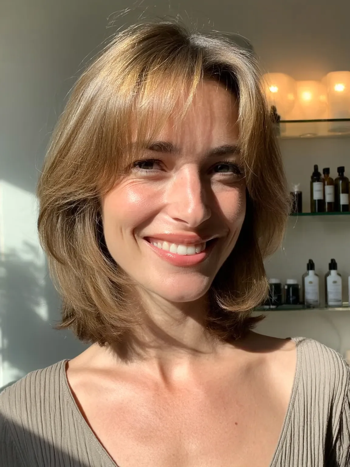 Sun-Kissed Light Brown Chin-Length Bob with Wispy Fringe